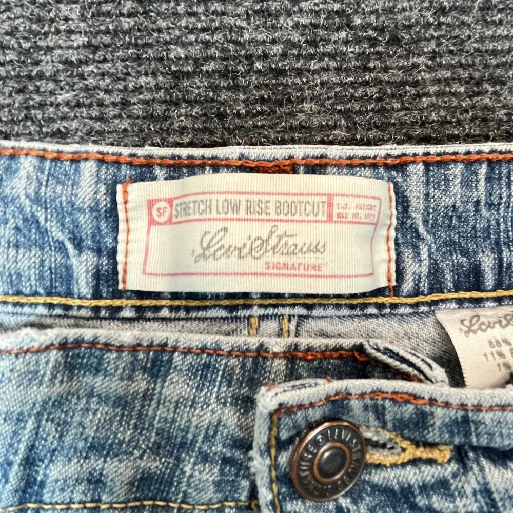 Levi Strauss Y2K Women 12 Light Wash Stretch Raw Hem Cut Off Denim Shorts Frayed